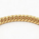 alt="ethnic gold bracelet"