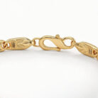 alt="gold bracelet for men"