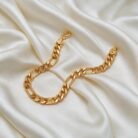 alt="figaro chain gold bracelet"