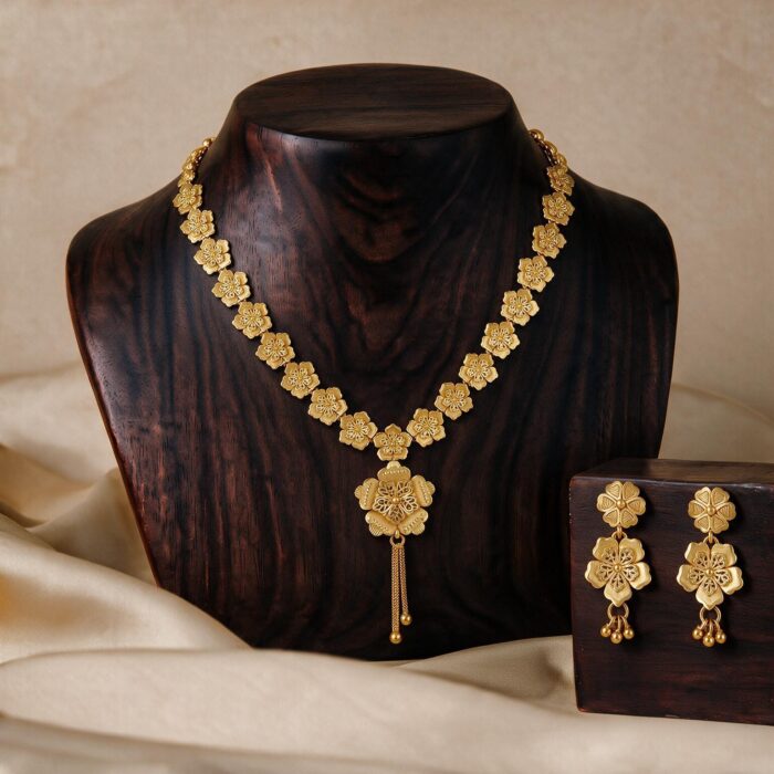 alt="royal gold plated necklace set for women"