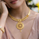alt="sunburst medallion necklace set"