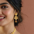 alt="royal gold plated necklace set for women"