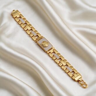 alt="lion head studded gold bracelet"