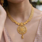 alt="round filigree necklace set"