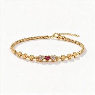 alt="triple heart studded gold bracelet"