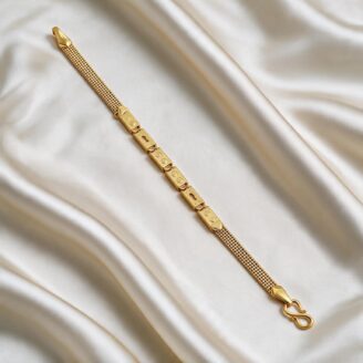 alt="textured mesh gold bracelet"