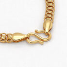 alt="curb chain gold bracelet"