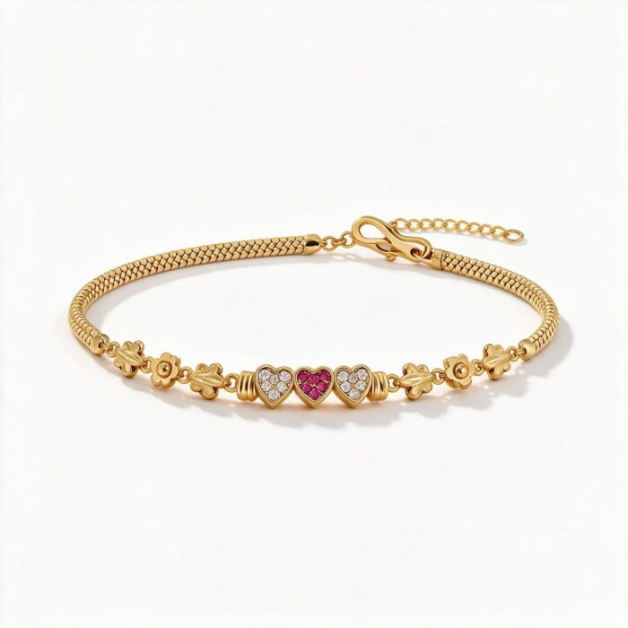 alt="triple heart studded gold bracelet"