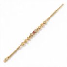 alt="triple heart studded gold bracelet"