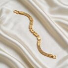 alt="textured mesh gold bracelet"